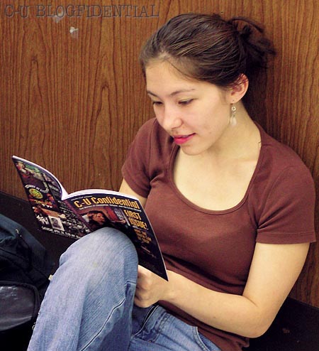 Dyanna Gregory relaxes with the first issue of C-U Confidential. (Photo by JaPan)