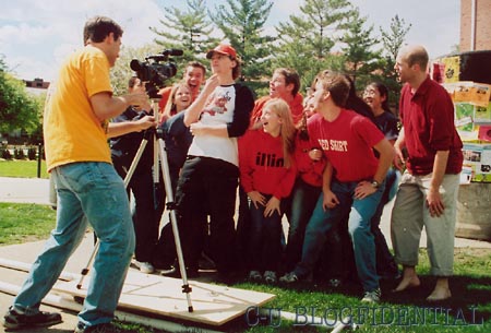 Chris Lukeman directs Jayme Richardson (with cap) and chorus in THE UNIVERSITY OF ILLINOIS VS. A MUMMY *