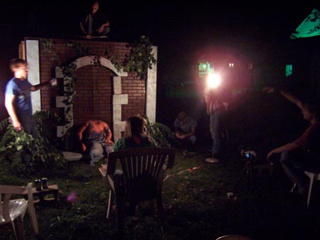 Jason Butler, Bradley Ledbetter (on tomb), Annie Fitzgerald, Jim Mefford, Michelle Jones, and Mark Peaslee set up a special effects shot for WEREWOLF CEMETERY